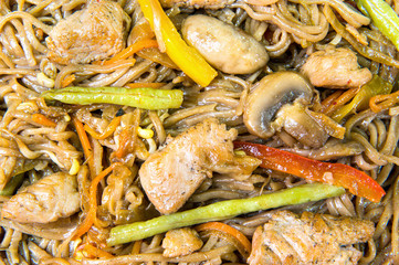 Spice fried noodles with colored peppers and sliced pork