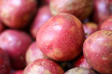 Red peaches in a shop window in a market