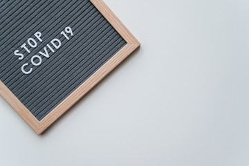 Stop Coronavirus Hashtag on Gray Background. Covid-19 warning concept banner. Flat lay felt board coronavirus typography design. Stop Coronavirus social media movement concept. Flat lay, top view.