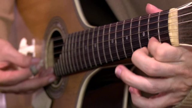 playing twelve steel strings portuguese guitar fado