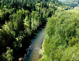 Fabulous aerial photography of Flaming Geyser State Park and the Green River on a partly cloudy summer day in Auburn Washington State