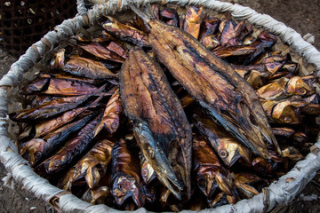 close up of basket with grilled dried fish in masoala madagascar