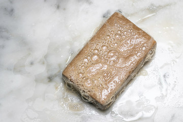 Bar of soap with bubbles Maintain hygiene and personal care with soap and water