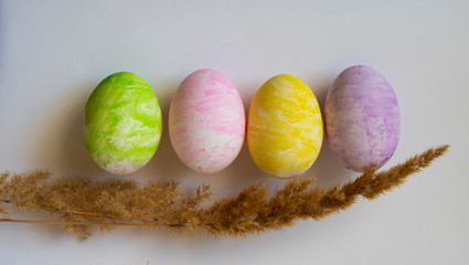 colored easter eggs on a white background