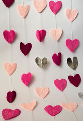 pink hearts cut out of paper