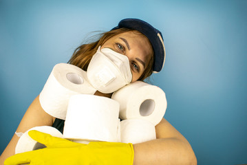 The young girl is very happy, she can now survive any pandemic, because she has toilet paper.