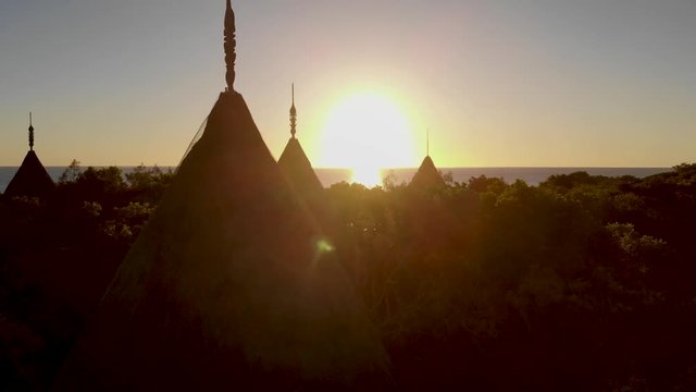Aerial drone footage of the western part of New Caledonia. The bay of Po&eacute;, The great blue lagoon. Typical houses for tourists in a luxury resort.