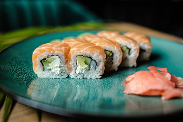 japanese sushi food. Maki ands rolls with tuna, salmon, shrimp, crab and avocado. Top view of sushi.