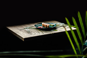 japanese sushi food. Maki ands rolls with tuna, salmon, shrimp, crab and avocado. Top view of sushi.