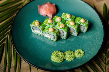 japanese sushi food. Maki ands rolls with tuna, salmon, shrimp, crab and avocado. Top view of sushi.
