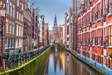 Photo sur Aluminium Amsterdam Amsterdam, Netherlands canals and church tower at dawn.