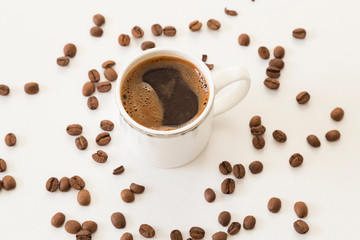 A cup of coffee bean concept on the white background.