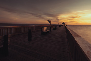 Horizontal longexposure photo of pier during sunrise, Deerfield beach, Florida,