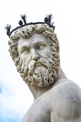Naklejka premium A beautiful sculpture of Neptune in piazza della Signoria.