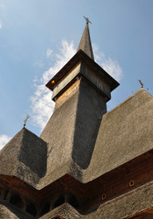 Fototapeta na wymiar Barsana Monastery, Maramures, Romania, Europe, August 2018. Wooden church of Barsana Monastery, monument of Transylvania..