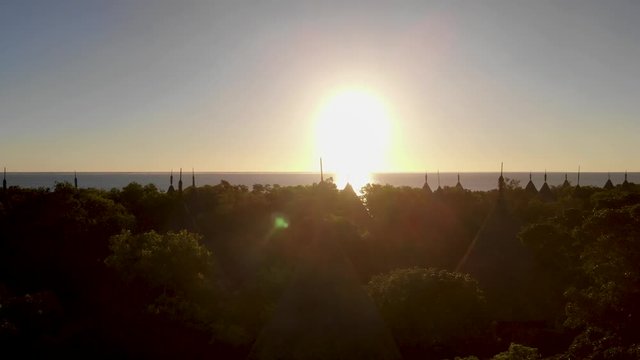 Aerial drone footage of the western part of New Caledonia. The bay of Po&eacute;, The great blue lagoon. Typical houses for tourists in a luxury resort.