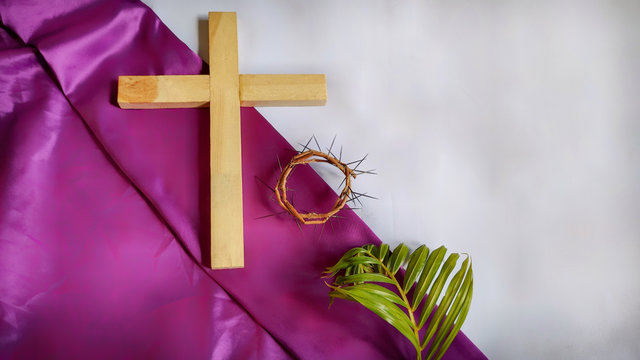 Lent Season,Holy Week and Good Friday concepts - image of wooden cross,crown of thorns and palm leave 