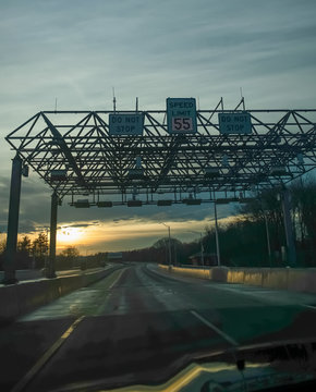 Perspective of highway at dusk - Maine turnpike.
