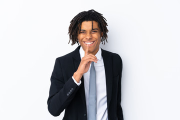 Young African American businessman man over isolated white background doing silence gesture