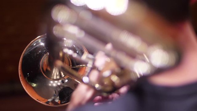orchestra musician playing trombone