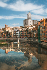 Cityscape with brightly colored stone houses of the old Quarter (Barri Vell)