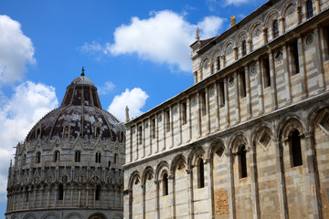 Pisa (PI), Italy - June 10, 2017: The " Piazza dei Miracoli " and Baptistery, Pisa, Tuscany, Italy, Europe