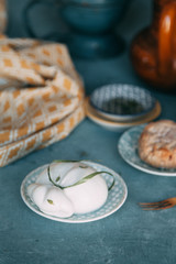Composition of cheese and olive oil. Mozzarella cheese on a plate.
