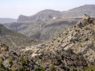 A small village hidden in a deep valley in the mountains, Oman