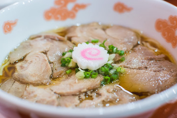 Japanese ramen recipe with pork slices and spring onion