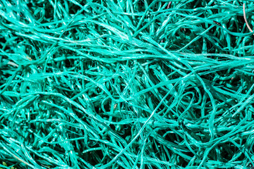Close up of entangled turquoise nets