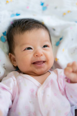 Cue Asian baby close up