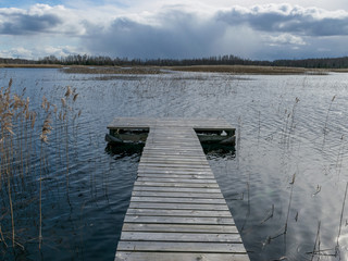 Obraz premium landscape with wooden footbridge in the center
