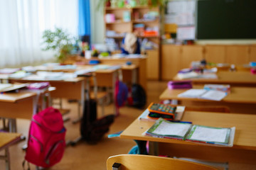 Interior of an empty school classroom. Concept of coronavirus COVID-19 quarantine in schools and educational institutions