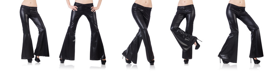 The black leather bell-bottomed trousers