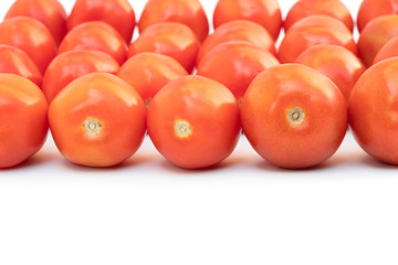Tomato isolated on a white background, close-up