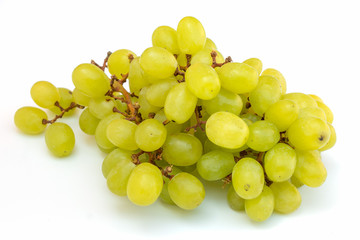 Bunch of fresh ripe juicy grapes isolated on white background.