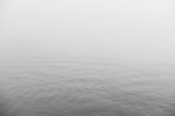 Fog in the lake. Morning nature water white fog.