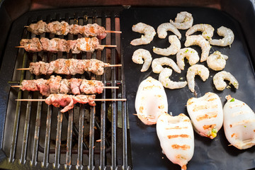 Shrimps, Souvlaki, Kalamari grillen © Michael