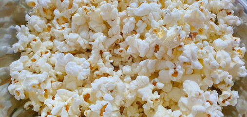 The texture of salted popcorn. Background. View from above.