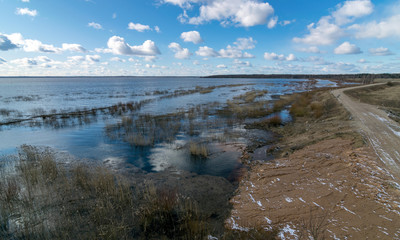 landscape with a flooded lake in spring