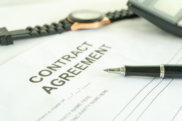 contract agreement document for sign with pen