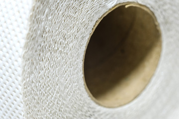 white Toilet paper layers fabricated from recycled paper close up macro shot