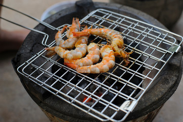 Grilled shrimps on the flaming grill Prepare ingredients for cooking.