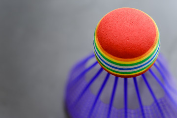 colorful plastic Badminton in the black ground closeup view