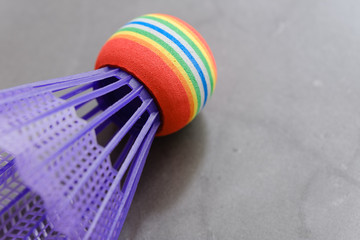 colorful plastic Badminton in the black ground closeup view