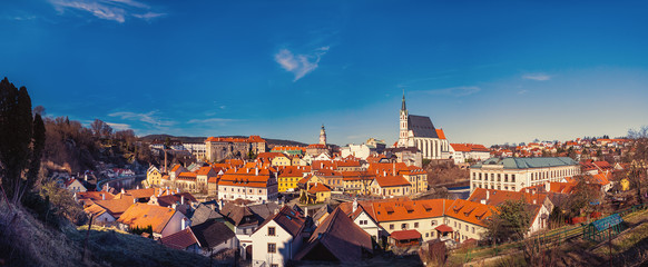 Naklejka na ściany i meble Cityscape panorama of Cesky Krumlov, Czech republic, with landmarks st. Vitus Church and Castle