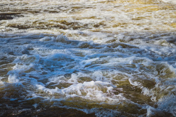 river water - foamy water surface on the river
