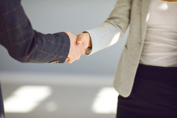 Handshake.Business people give a handshake at a meeting a successful contract in the office