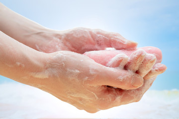 Antibacterial soap in hands. Hand disinfection with soap. Cleanliness and hygiene in everyday life. Hand hygiene