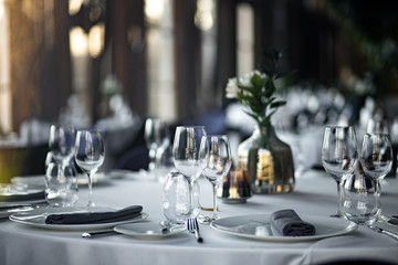Beautiful table set for an event party or wedding reception . restaurant interior